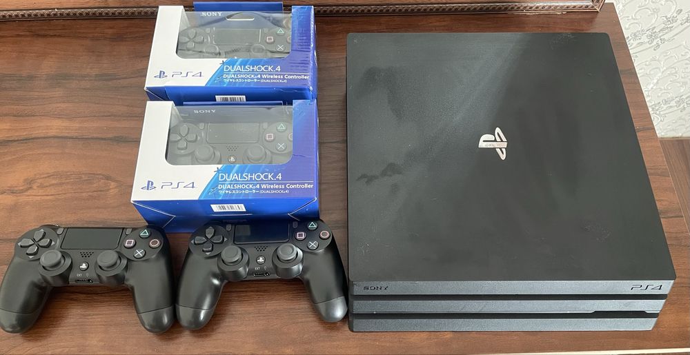 Ps4 Pro 1TB с 27 топ играми + 4 джойстика
