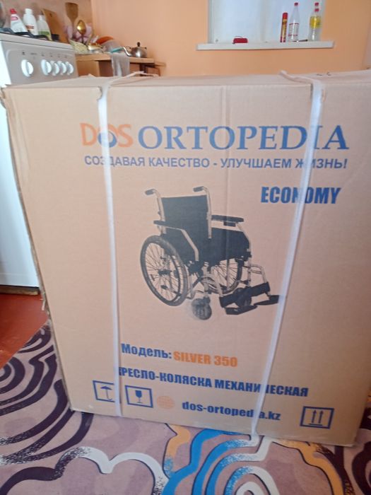 Механическая коляска