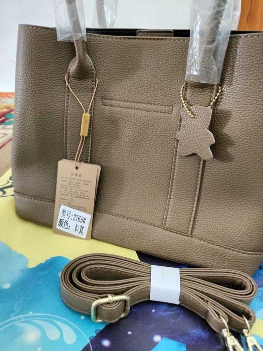 Новая кожаная сумка