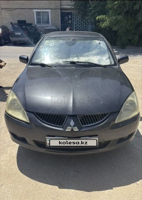 Машина Mitsubishi Lancer