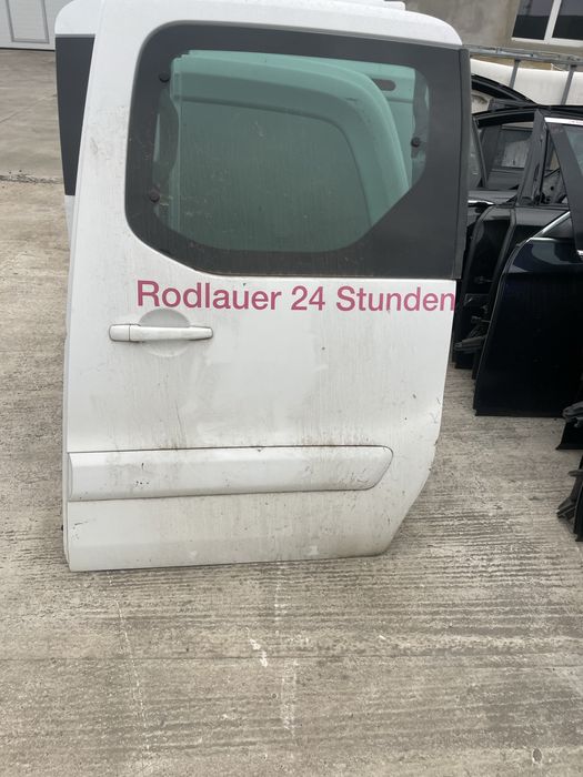 Usa laterala berlingo cu geam