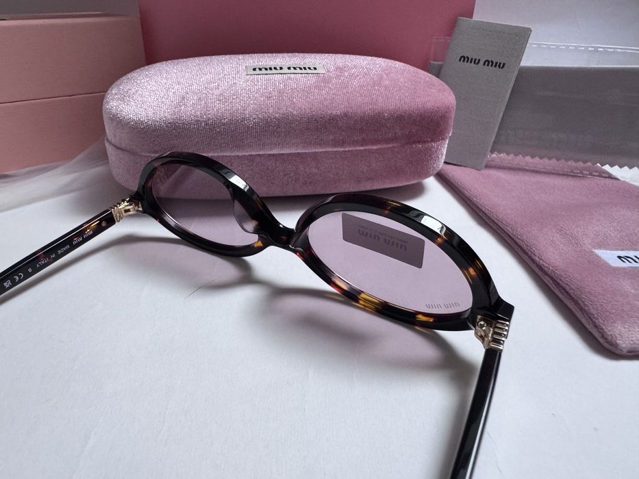 Ochelari de soare Miu Miu Oval SMU04Z 50-18 140, Noi