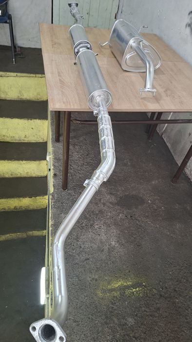 Жентира Ласетти Глушитель