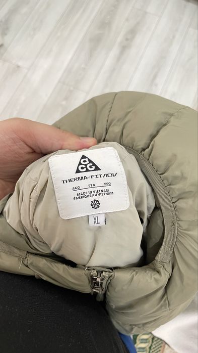 пуховик nike acg