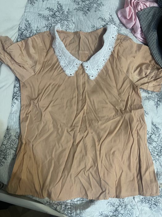 одежды по 1000 тг