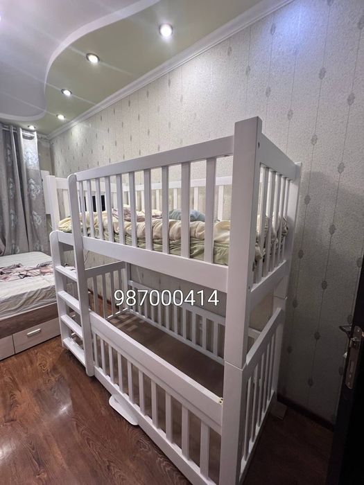 Двухьярусная кроватиь