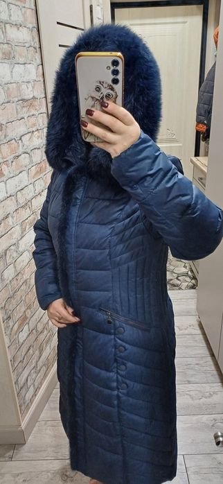 Продам женский пуховик