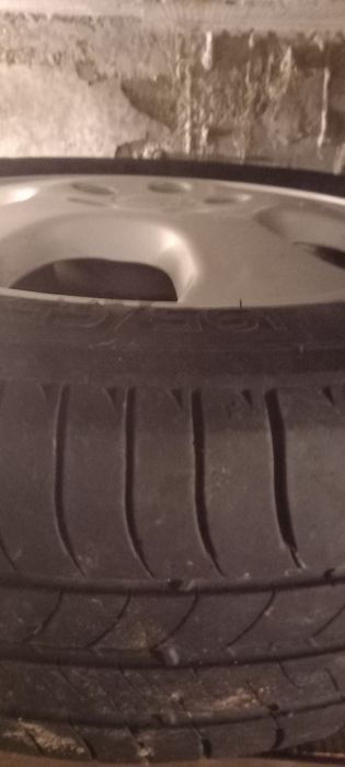 Vând set 4 jante aluminiu 5 prezoane echipate cu cauciucuri de vara .