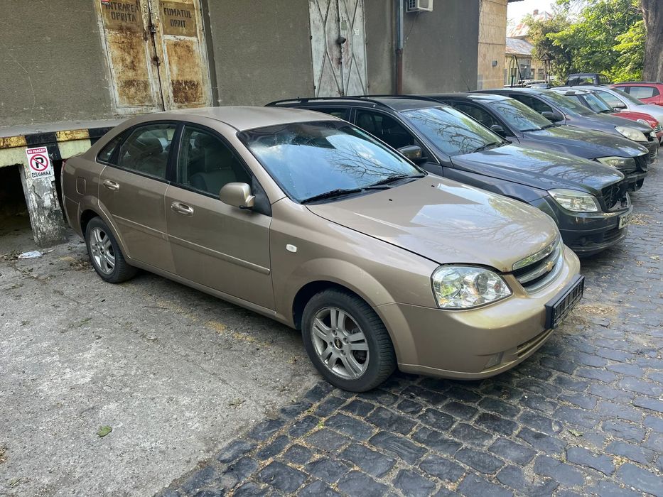 Dezmembrez Chevrolet Lacetti benzina bej auriu 2006