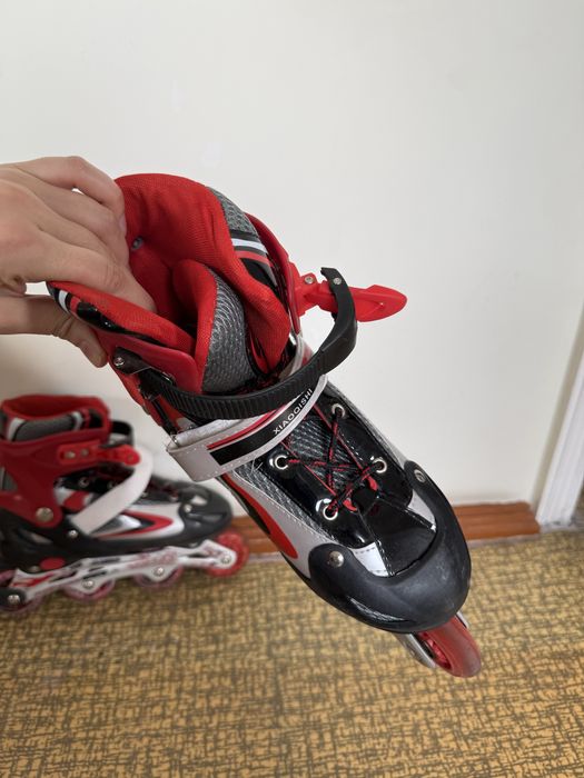 Роликовые коньки