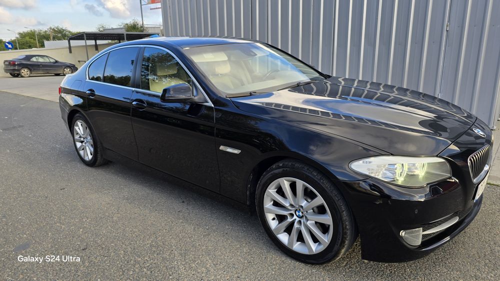 BMW 5 Series 2011 — imagine 32
