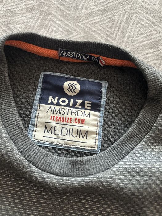 NOIZE brand sweatshirt with a bicycle