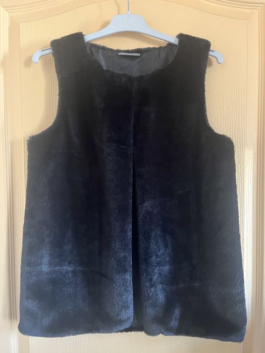 Пухкав елек чисто нов