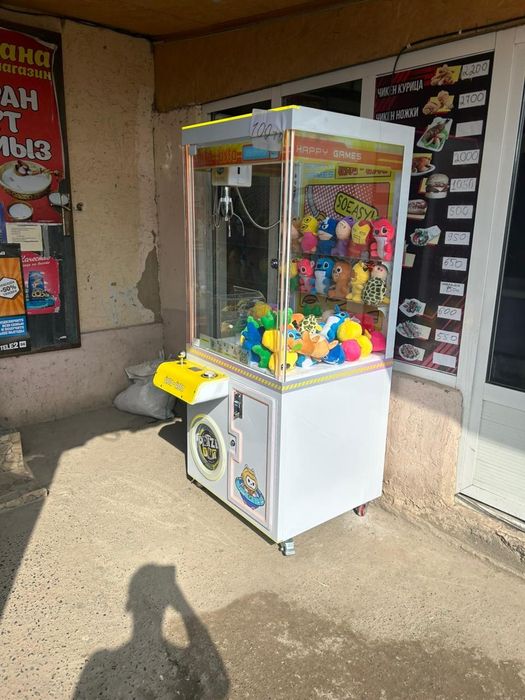 Игровой аппарат хватайка