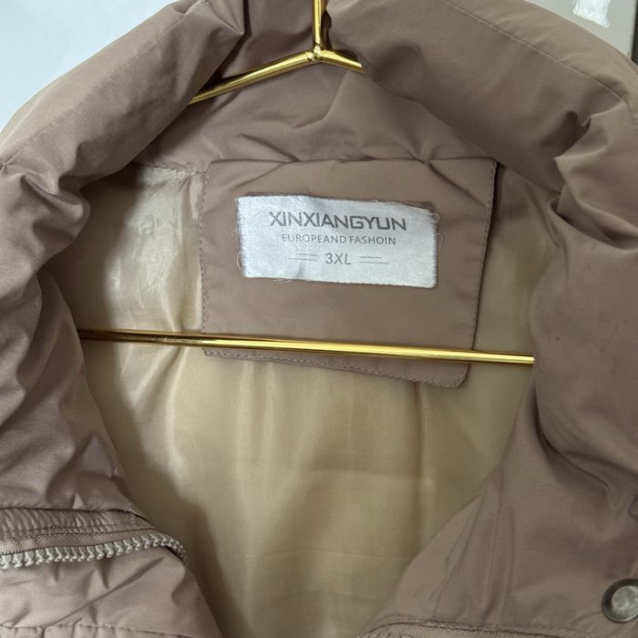 Kurtka qishki ayollar va qilar uchun