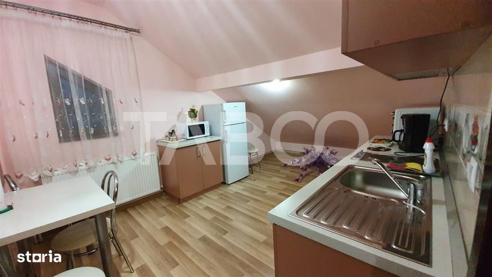 Apartament de inchiriat  56 mpu 2 camere mansarda in vila Selimbar