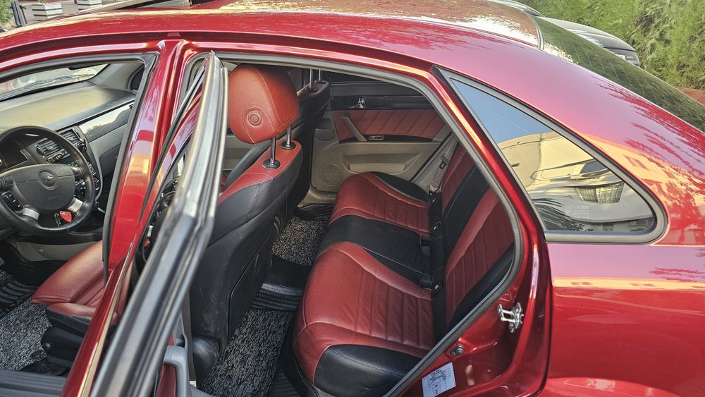 Gentra 2021 автомат коробка, цвет вишневый