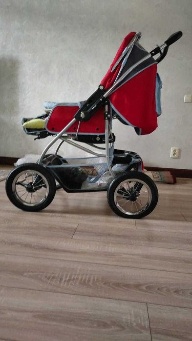 Коляска с амортизаторами