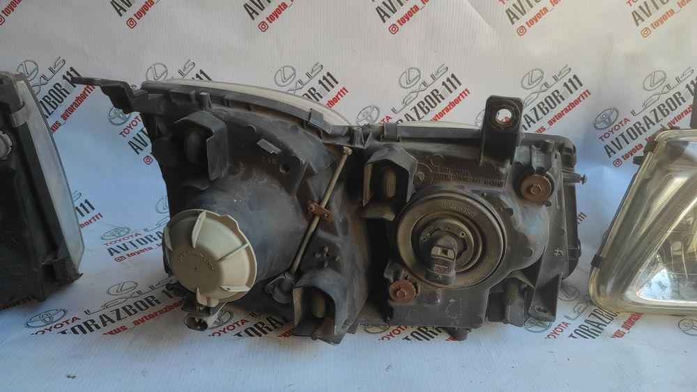 Фара левая LX470 стекло