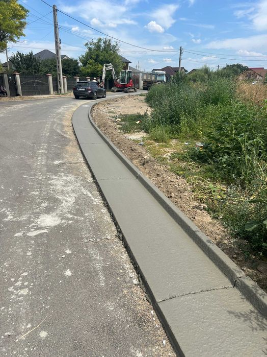 Santuri si rigole betonate  rigole de acostament realizate mecanizat