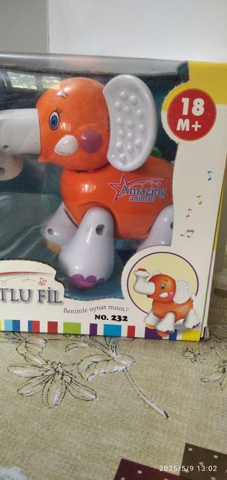 Заводная игрушка - Слоник.