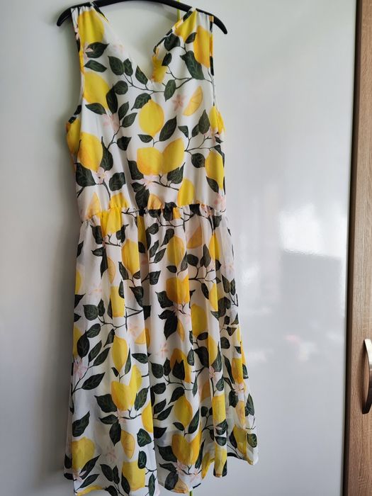 Рокличка с лимони H&M ,ръст 146-152см,възраст 10-12 години
