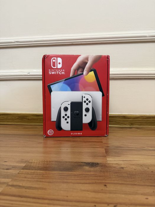 Nintendo Switch OLED белый + FIFA 23 + Mortal Kombat 11