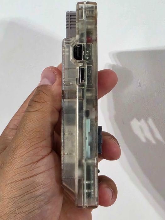 Nintendo Gameboy Poket transparent editie limitata si joc Aladdin