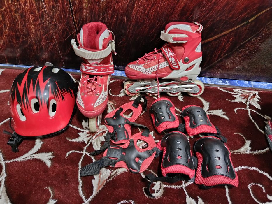 Роликовые коньки