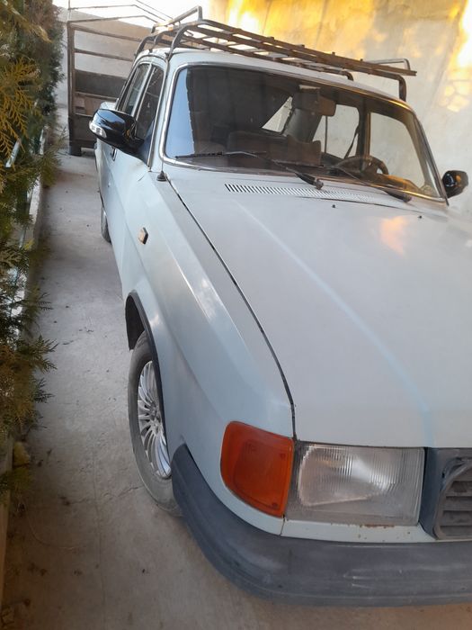 Газ 31029 сотилади прицепи билан.