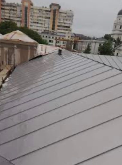 Reparati acoperisuri vopsit tabla