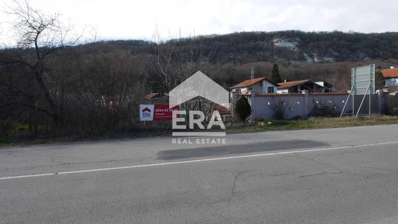 Урегулиран поземлен имот за продажба, с лице на главен път, в курортен