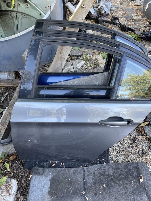 Usa stanga spate bmw e90 portiera stanga spate bmw e90