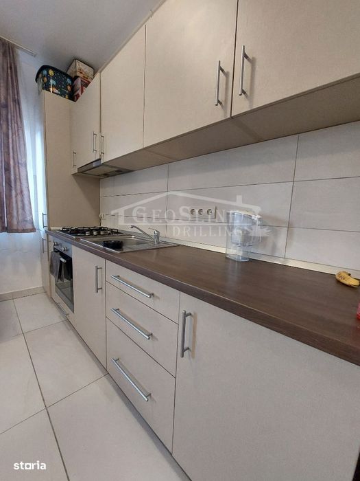 Apartament 2 dormitoare 1 Open-space Parcare privată extra