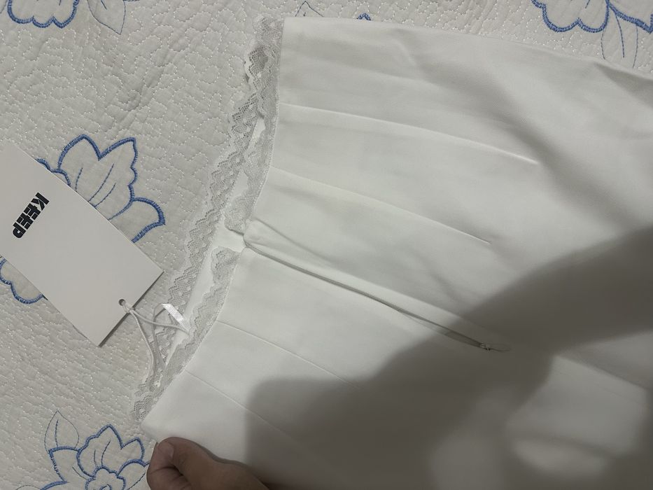 Белая юбка новая.