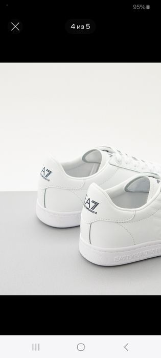 Продаются белые кеды EА7