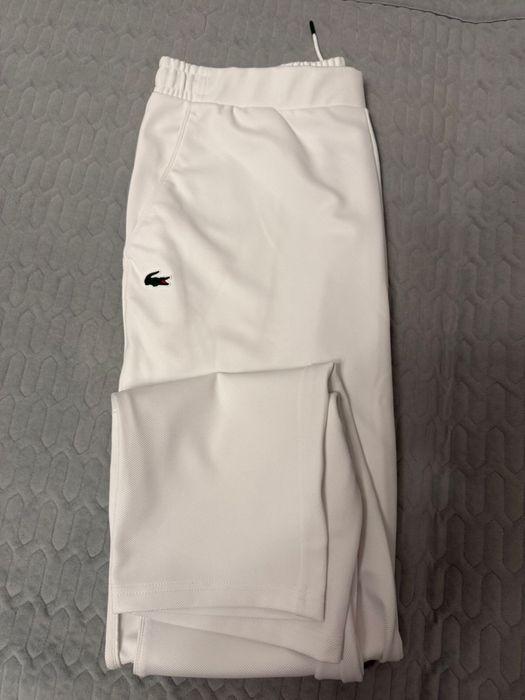 Продам спортивные брюки Lacoste