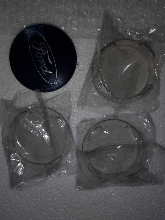 Capacele jante originale ford diametru 54-55 ext.-52 int aproximativ