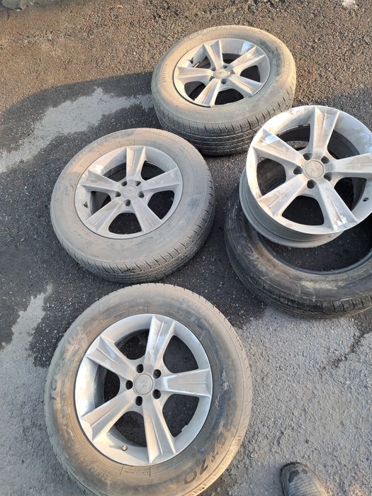 Диски с шинами 215/65R16 5x100