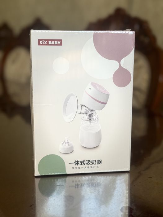 Электрический молокоотсос