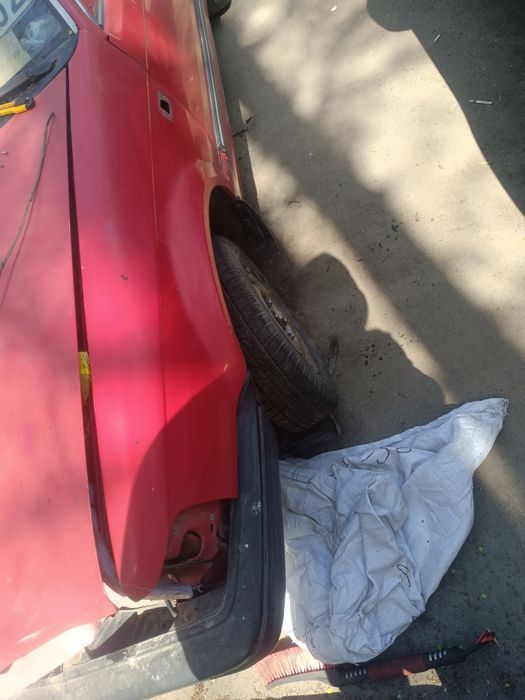 Переднее левое крыло Mazda 323