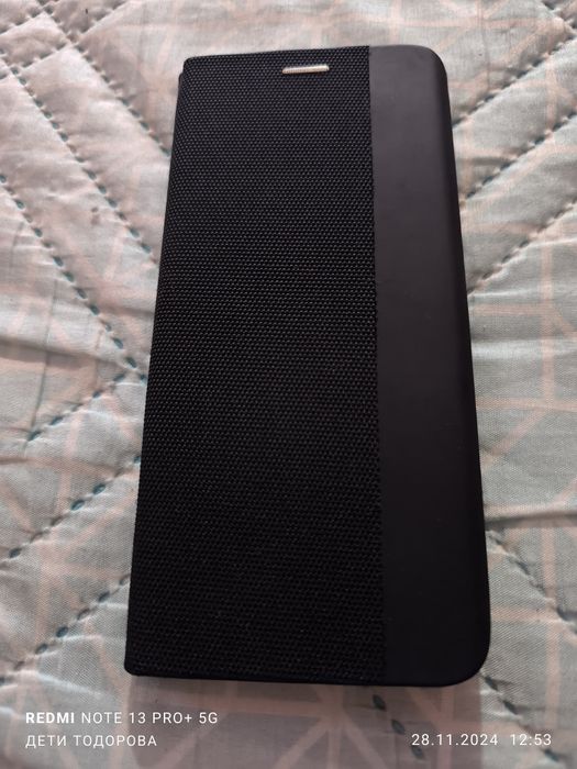 Продавам чисто нов калъф-тефтер,черен за Samsung Galaxy A05s .