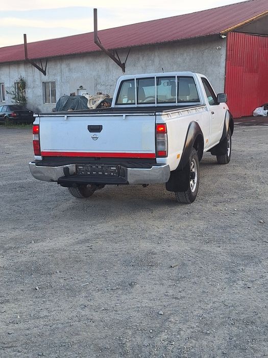 Nissan navara 2.5 diesel 4x4 mic mare bena lunga an 2005