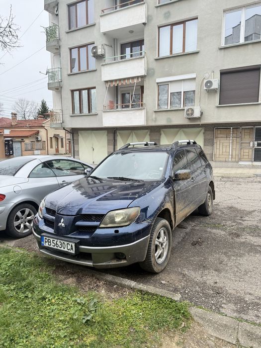Mitsubishi outlander 2.0 на части или цял