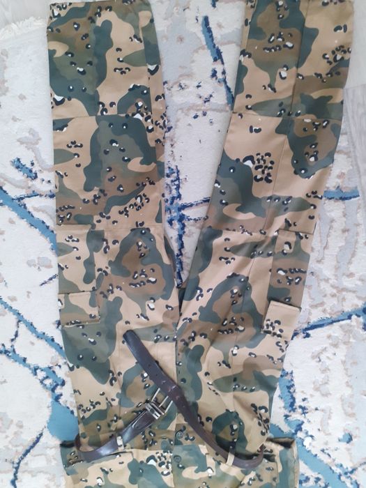 Камуфляж костюм новый.