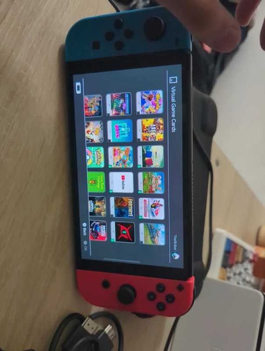 Nintendo Switch Oled + Full accessories