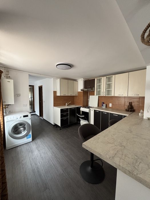 Apartament la casa cu curte