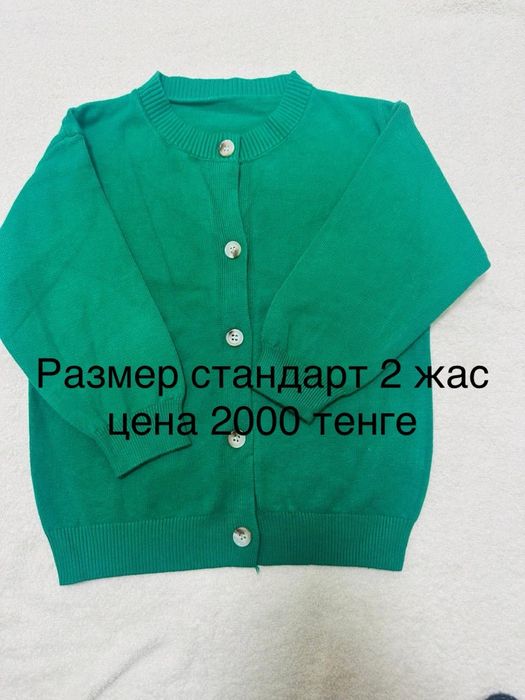 Детские одежды новый