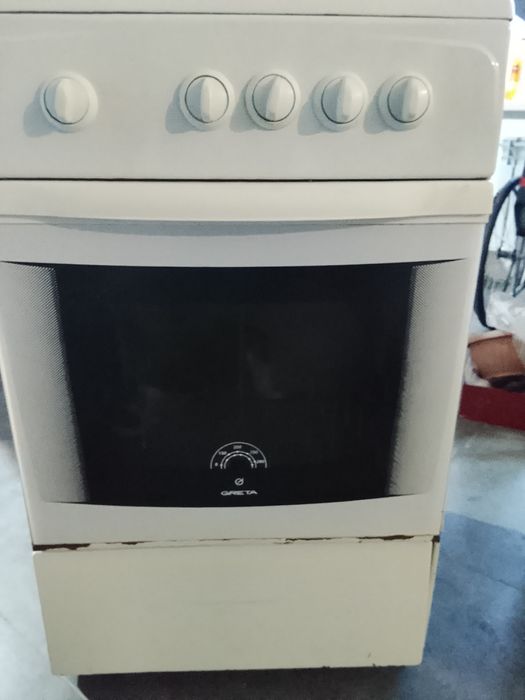 Газовая плита четырех камфорная