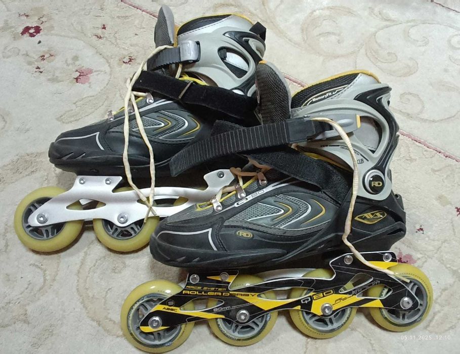 Роликовые коньки